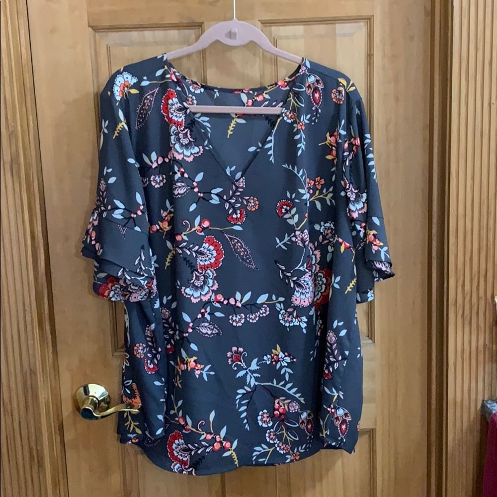 Ruffle sleeve top.